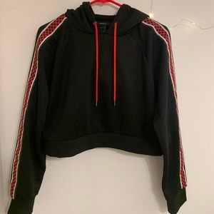 black cropped hoodie with red racer sleeves